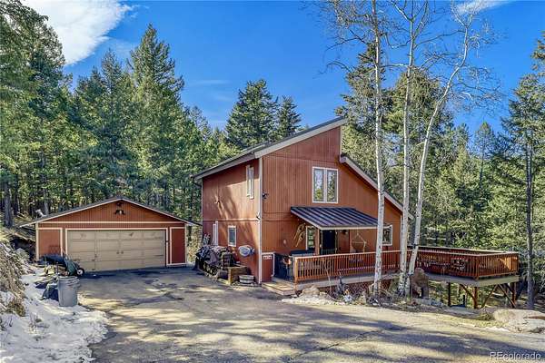 1.5 Acres of Land with Home for Sale in Evergreen, Colorado