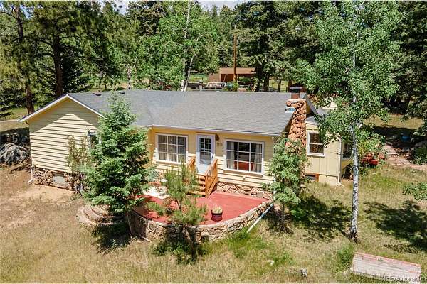 3.1 Acres of Land with Home for Sale in Evergreen, Colorado