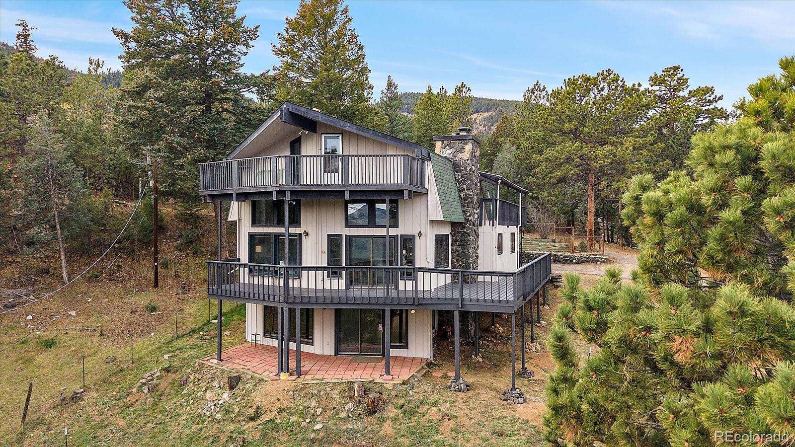 5 Acres of Land with Home for Sale in Evergreen, Colorado