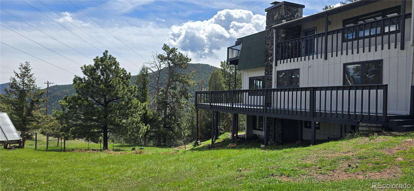 5 Acres of Land with Home for Sale in Evergreen, Colorado