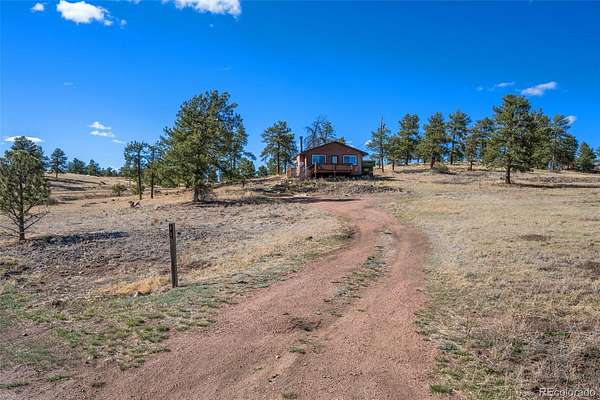 5 Acres of Land with Home for Sale in Guffey, Colorado