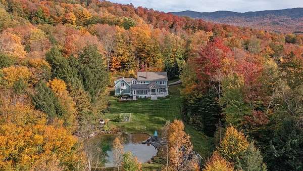 4 Acres of Land with Home for Sale in Stowe, Vermont
