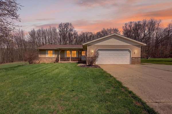 13.9 Acres of Land with Home for Sale in Cedar Springs, Michigan