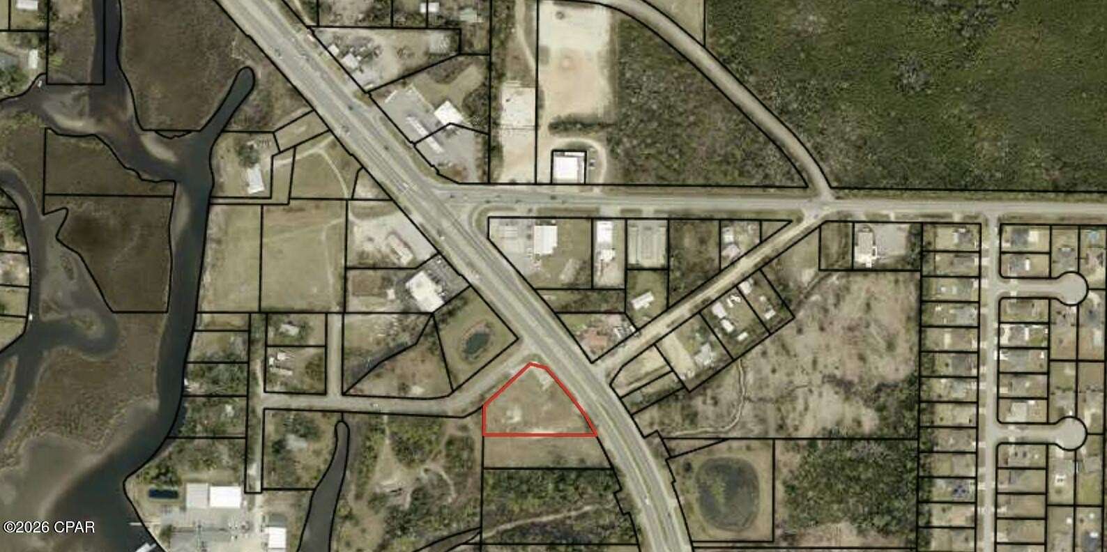 0.84 Acres of Commercial Land for Sale in Southport, Florida