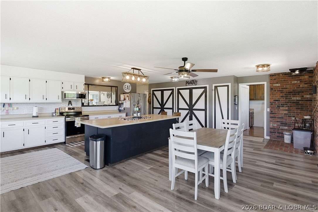 3.85 Acres of Land with Home for Sale in Eldon, Missouri