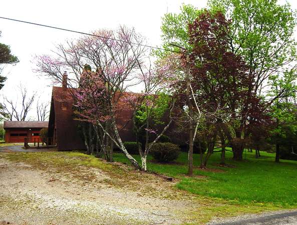 1.67 Acres of Land with Home for Auction in Huntsville, Ohio