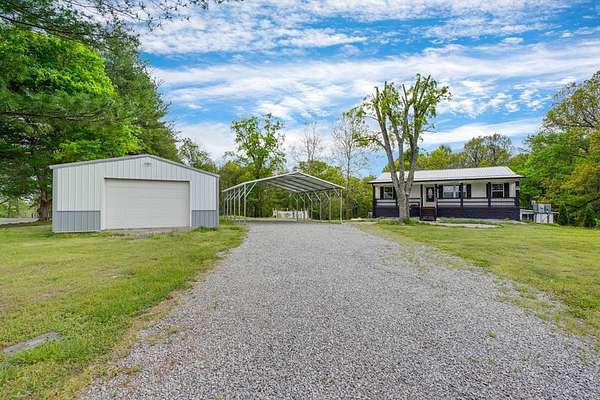 2.74 Acres of Land with Home for Sale in Manitou, Kentucky