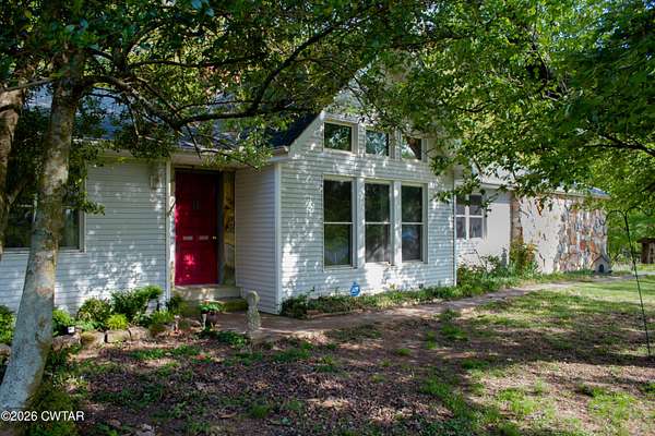 5.1 Acres of Land with Home for Sale in Henry, Tennessee