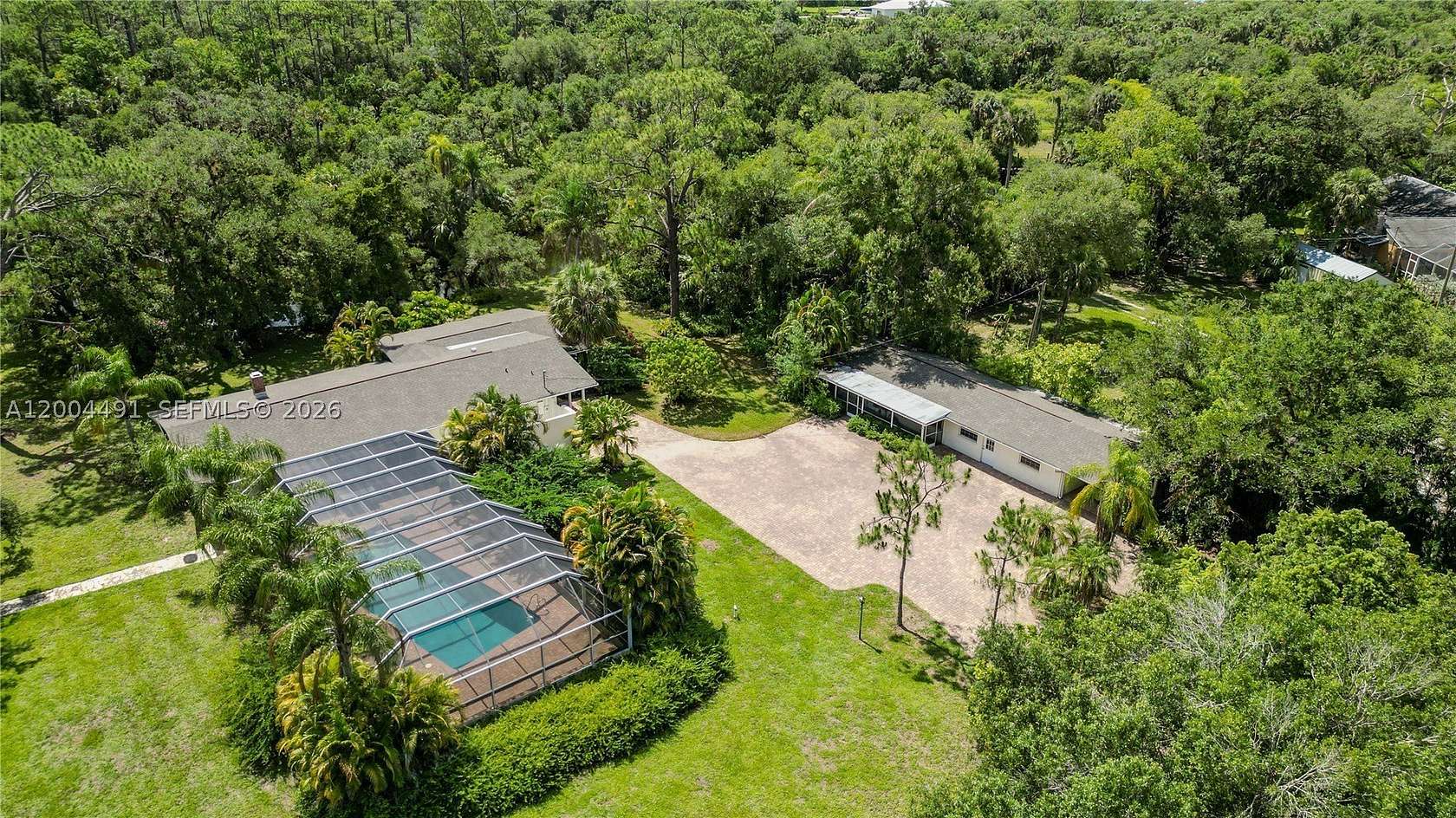 3.2 Acres of Land with Home for Sale in Alva, Florida