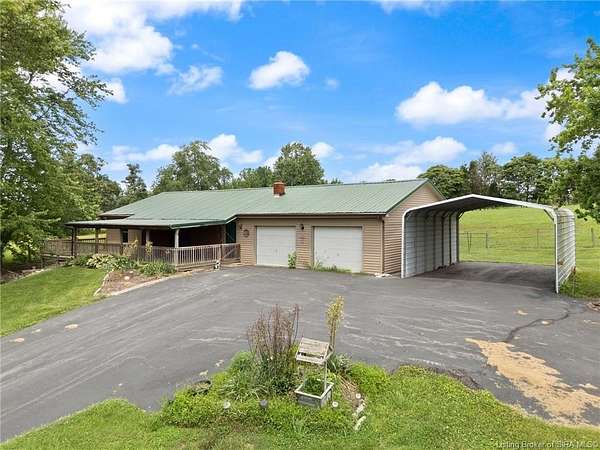 14.3 Acres of Land with Home for Sale in Henryville, Indiana
