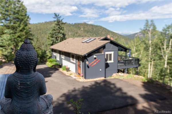 2 Acres of Land with Home for Sale in Aspen Park, Colorado