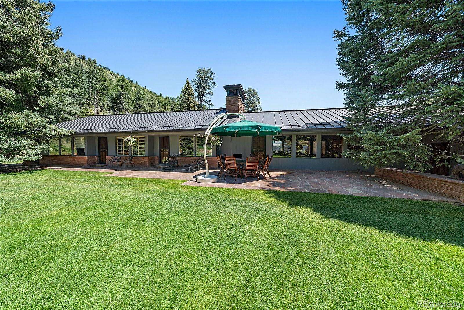 25 Acres of Land with Home for Sale in Evergreen, Colorado