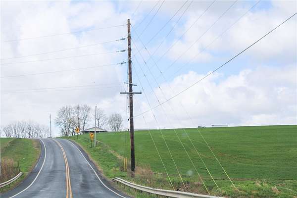 7 Acres of Land with Home for Auction in Savannah, New York