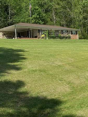 7.2 Acres of Land with Home for Sale in Dellrose, Tennessee