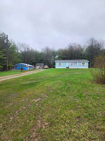 5.29 Acres of Land with Home for Sale in Barryton, Michigan