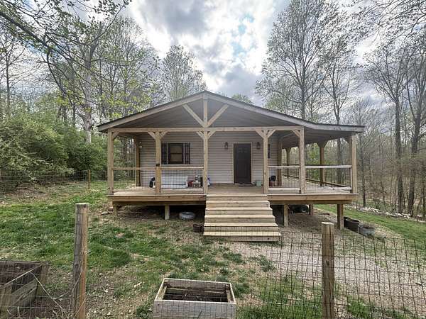 9.73 Acres of Land with Home for Sale in Trafalgar, Indiana