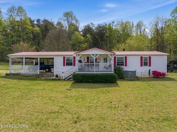 5.24 Acres of Land with Home for Sale in Ten Mile, Tennessee