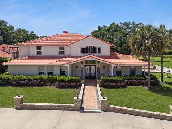 5.26 Acres of Land with Home for Sale in Longwood, Florida