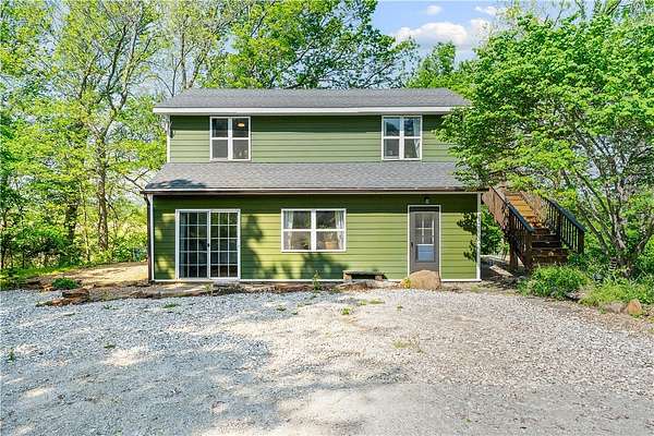 8 Acres of Land with Home for Sale in Elkins, Arkansas