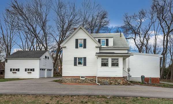 4.36 Acres of Land with Home for Sale in Somersworth, New Hampshire