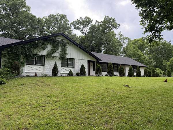 10 Acres of Recreational Land with Home for Sale in Springfield, Missouri