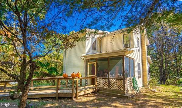 7 Acres of Land with Home for Sale in Berkeley Springs, West Virginia