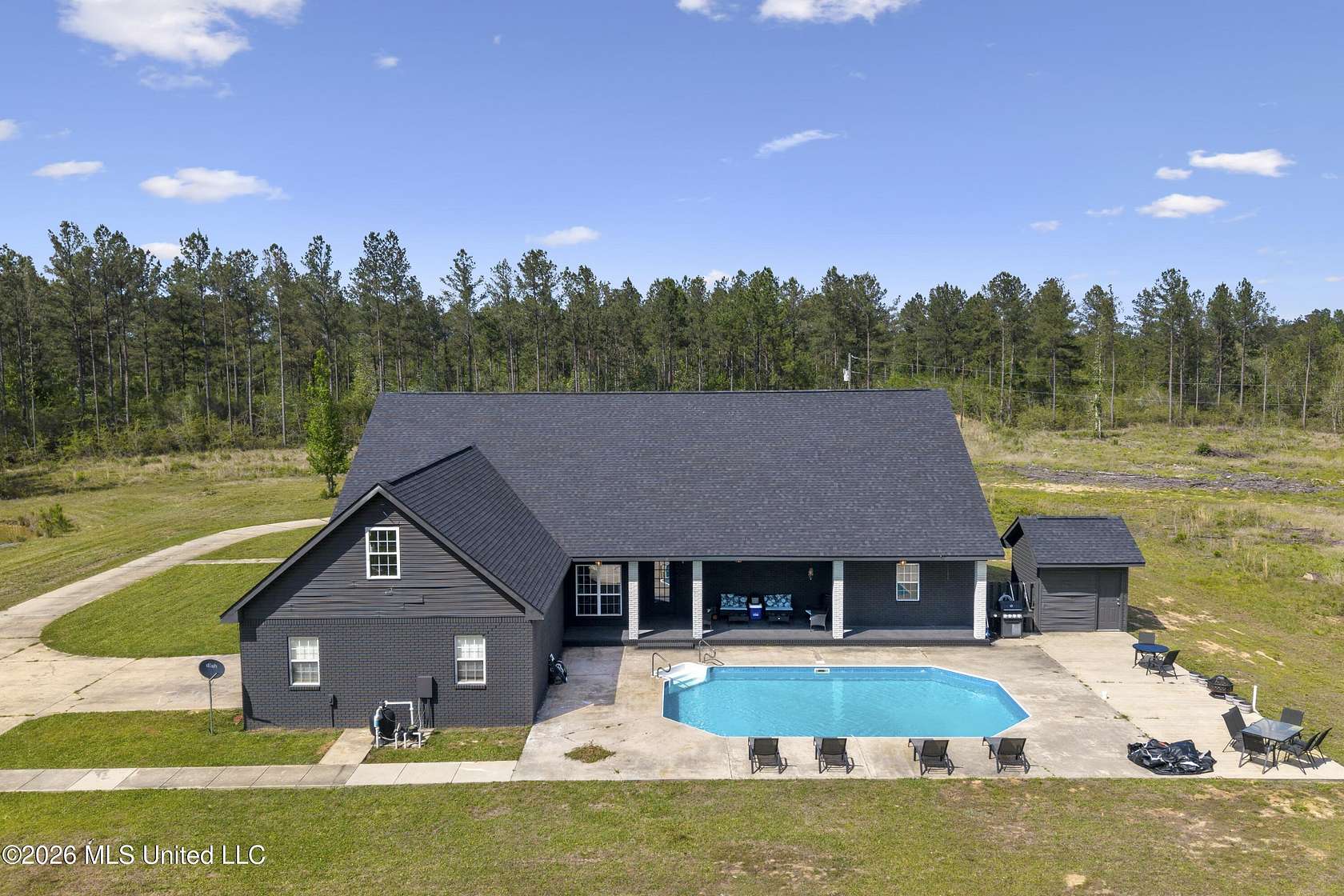 7.7 Acres of Land with Home for Sale in Wiggins, Mississippi