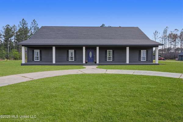 7.7 Acres of Land with Home for Sale in Wiggins, Mississippi