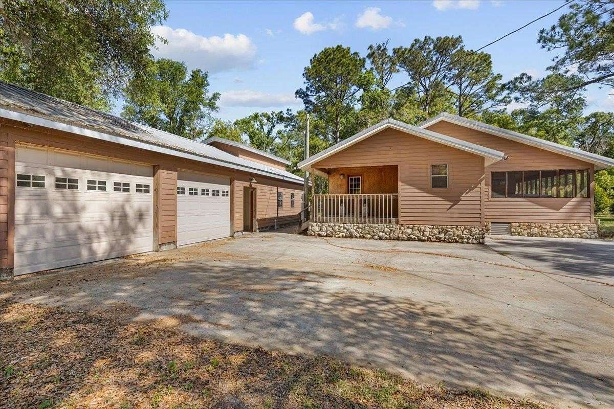 1.67 Acres of Land with Home for Sale in Perry, Florida