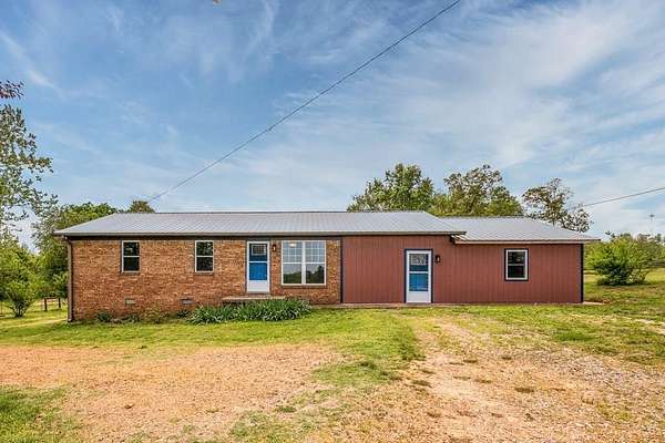 17 Acres of Land with Home for Sale in Cottage Grove, Tennessee