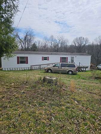 14 Acres of Land with Home for Auction in Altamont, Tennessee