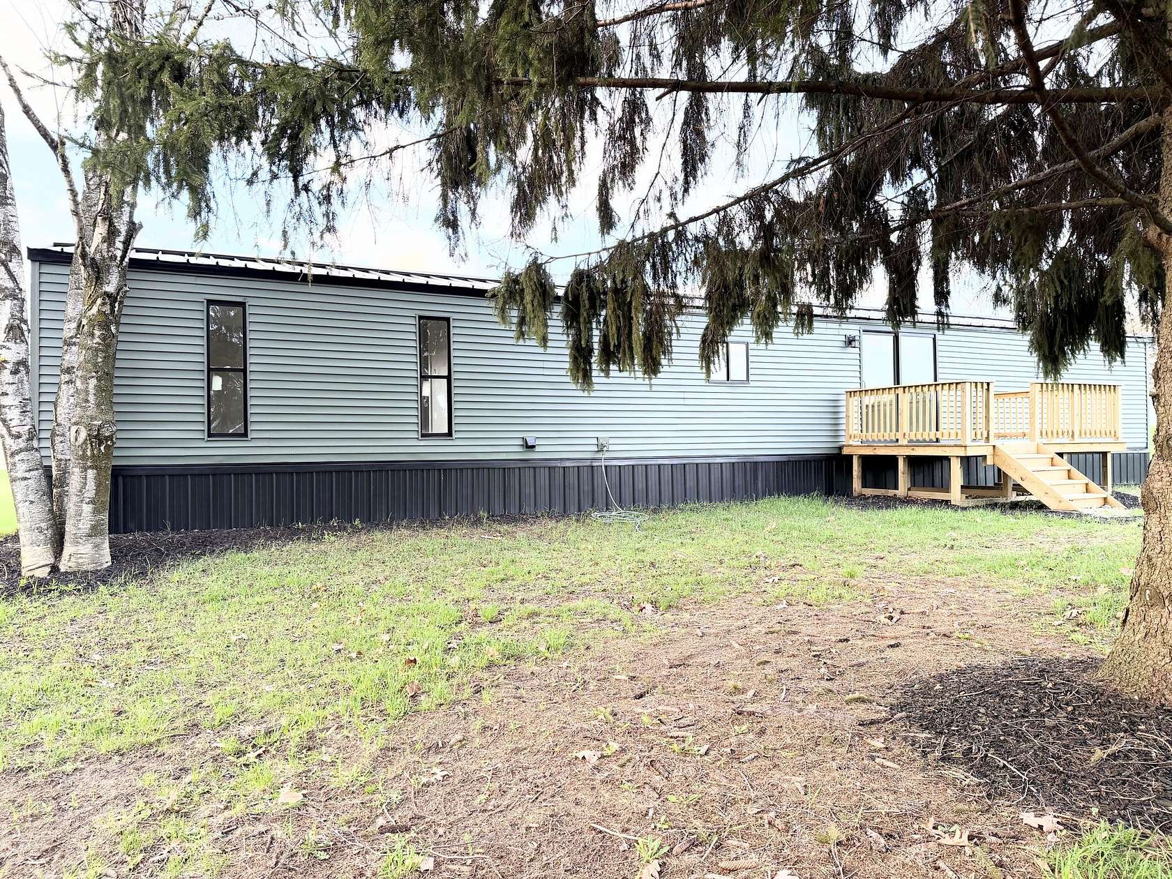 2.57 Acres of Land with Home for Sale in Six Lakes, Michigan