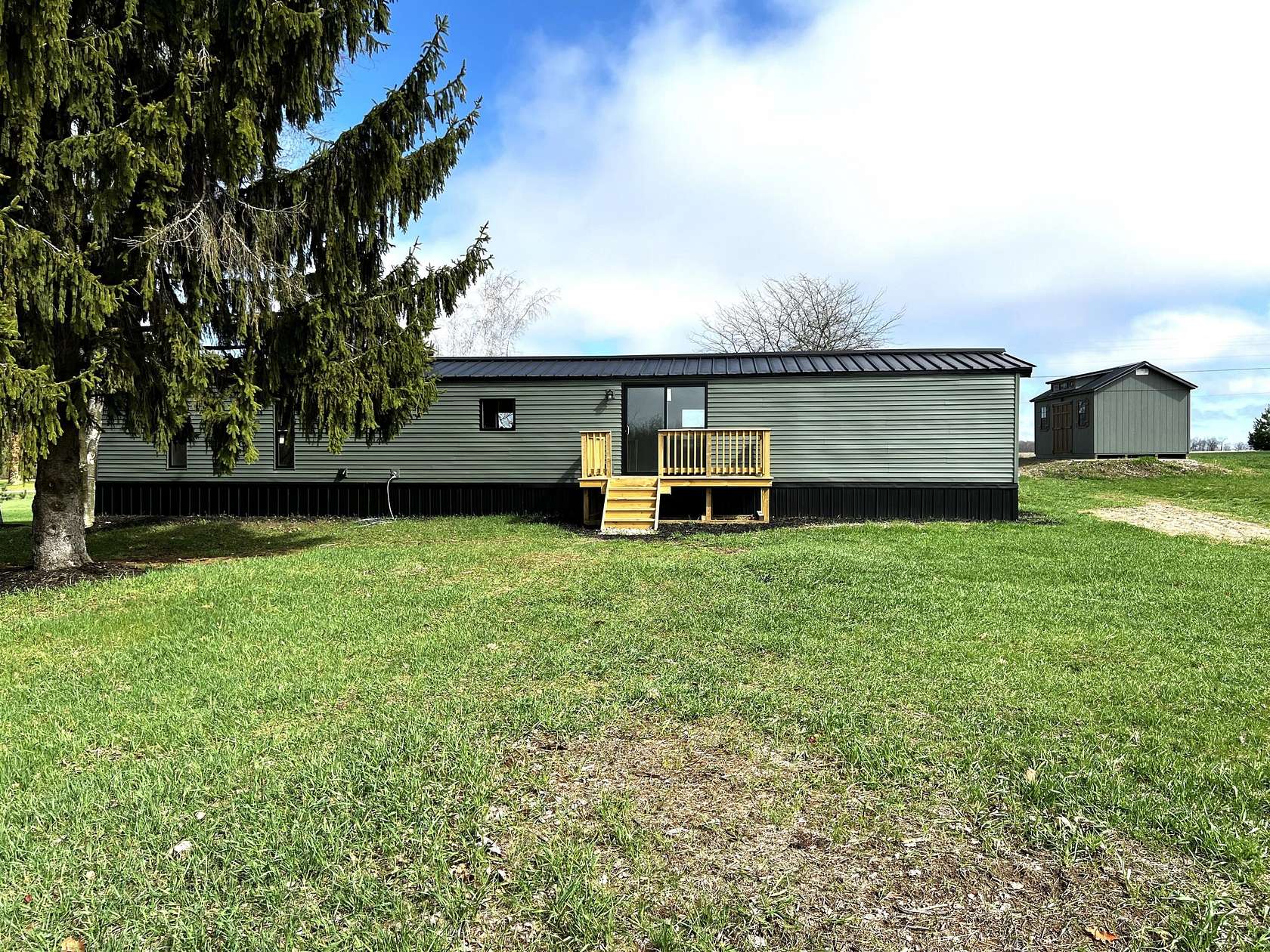 2.57 Acres of Land with Home for Sale in Six Lakes, Michigan