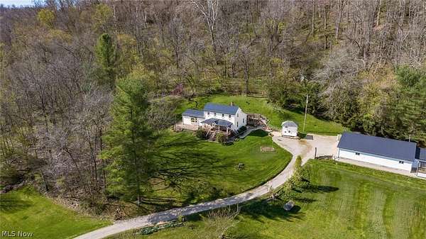 7.74 Acres of Land with Home for Sale in Blue Rock, Ohio