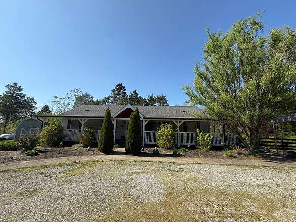 5.59 Acres of Land with Home for Sale in Madison, Indiana