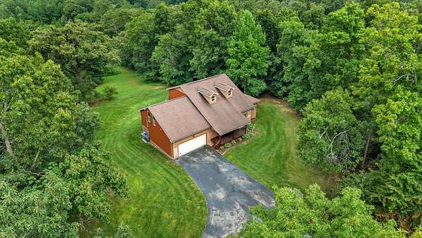 7.3 Acres of Land with Home for Sale in Cleveland, Tennessee