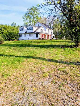 4.79 Acres of Land with Home for Auction in Celina, Tennessee