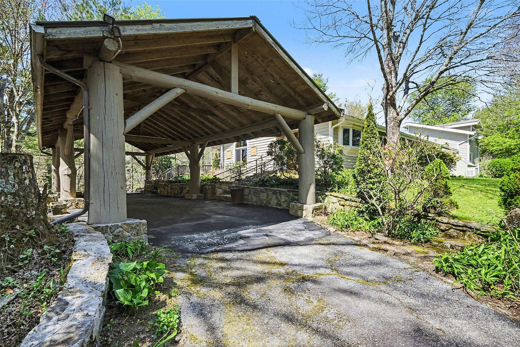 8.72 Acres of Land with Home for Sale in Scaly Mountain, North Carolina