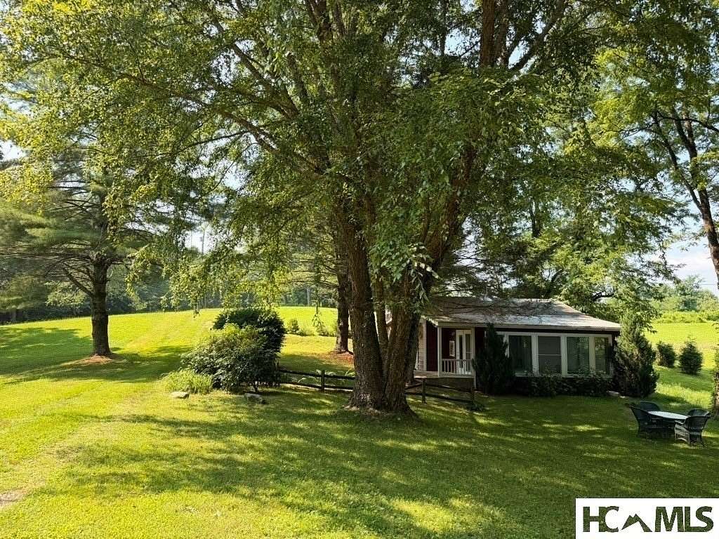 8.72 Acres of Land with Home for Sale in Scaly Mountain, North Carolina