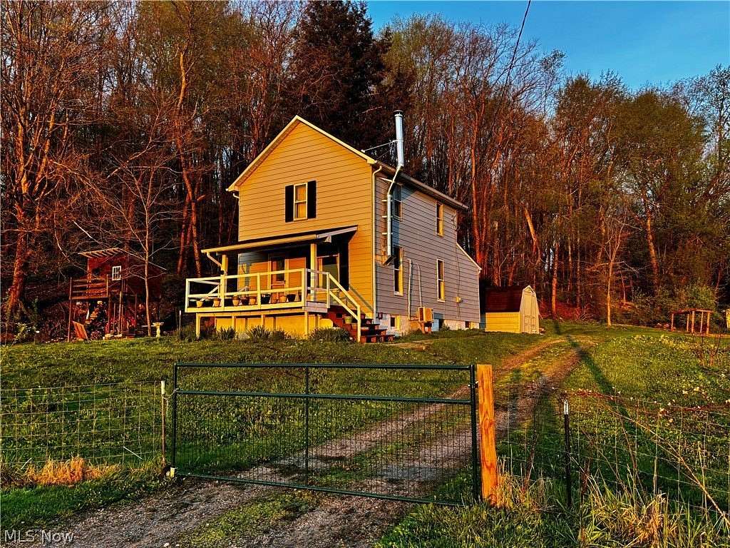 1.79 Acres of Land with Home for Sale in Minerva, Ohio
