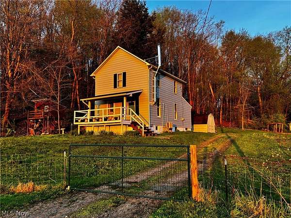 1.79 Acres of Land with Home for Sale in Minerva, Ohio