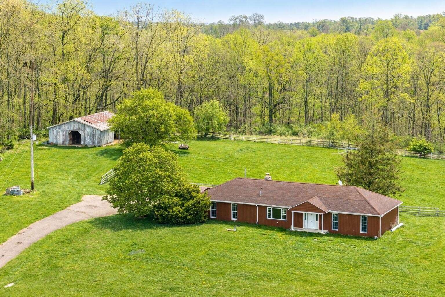 9.8 Acres of Land with Home for Sale in St. Paris, Ohio