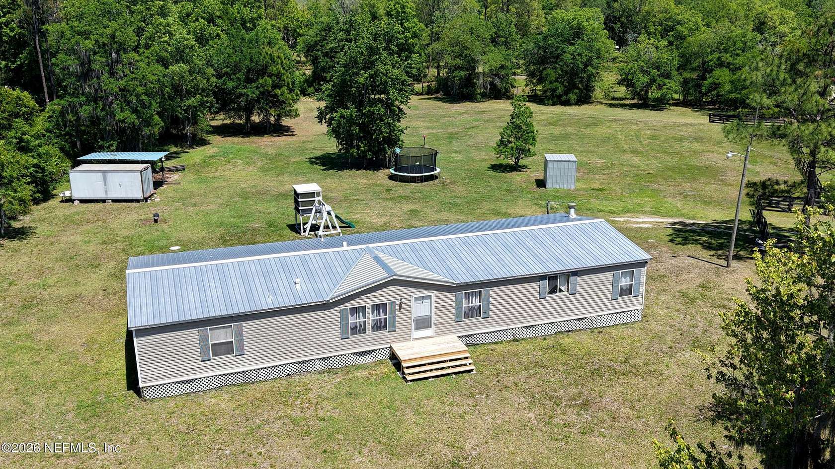 2.66 Acres of Land with Home for Sale in Elkton, Florida