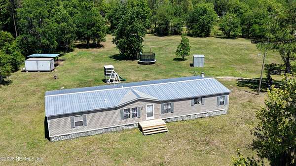 2.66 Acres of Land with Home for Sale in Elkton, Florida