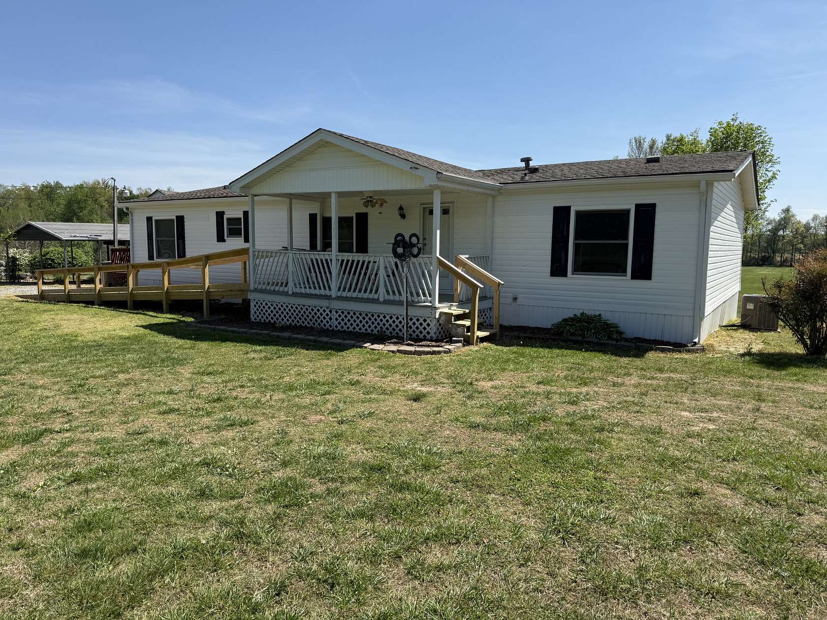 7.39 Acres of Land with Home for Auction in Bradyville, Tennessee