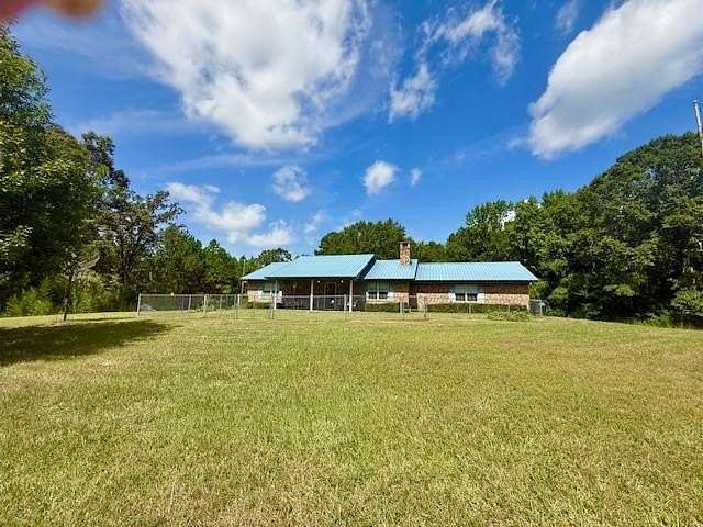 11.8 Acres of Land with Home for Sale in San Augustine, Texas