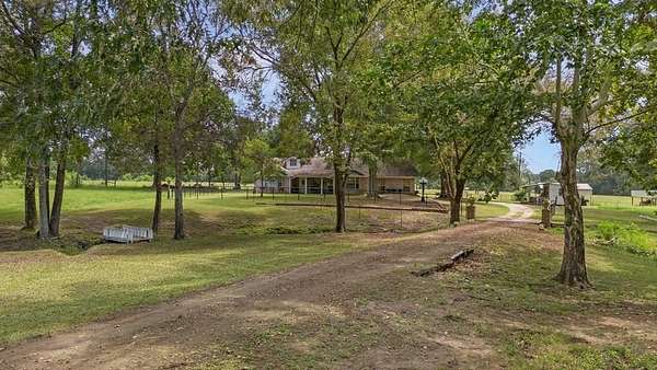 26.6 Acres of Agricultural Land with Home for Sale in Broaddus, Texas