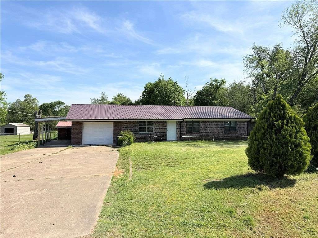 0.86 Acres of Land with Home for Sale in Clarksville, Arkansas