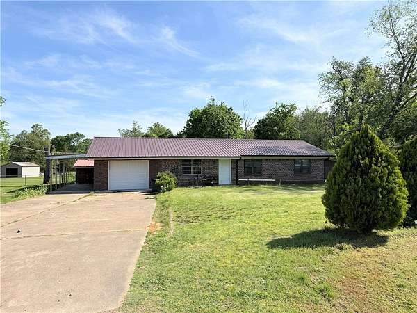 0.86 Acres of Land with Home for Sale in Clarksville, Arkansas