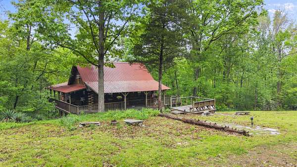 9.73 Acres of Land with Home for Sale in Timbo, Arkansas